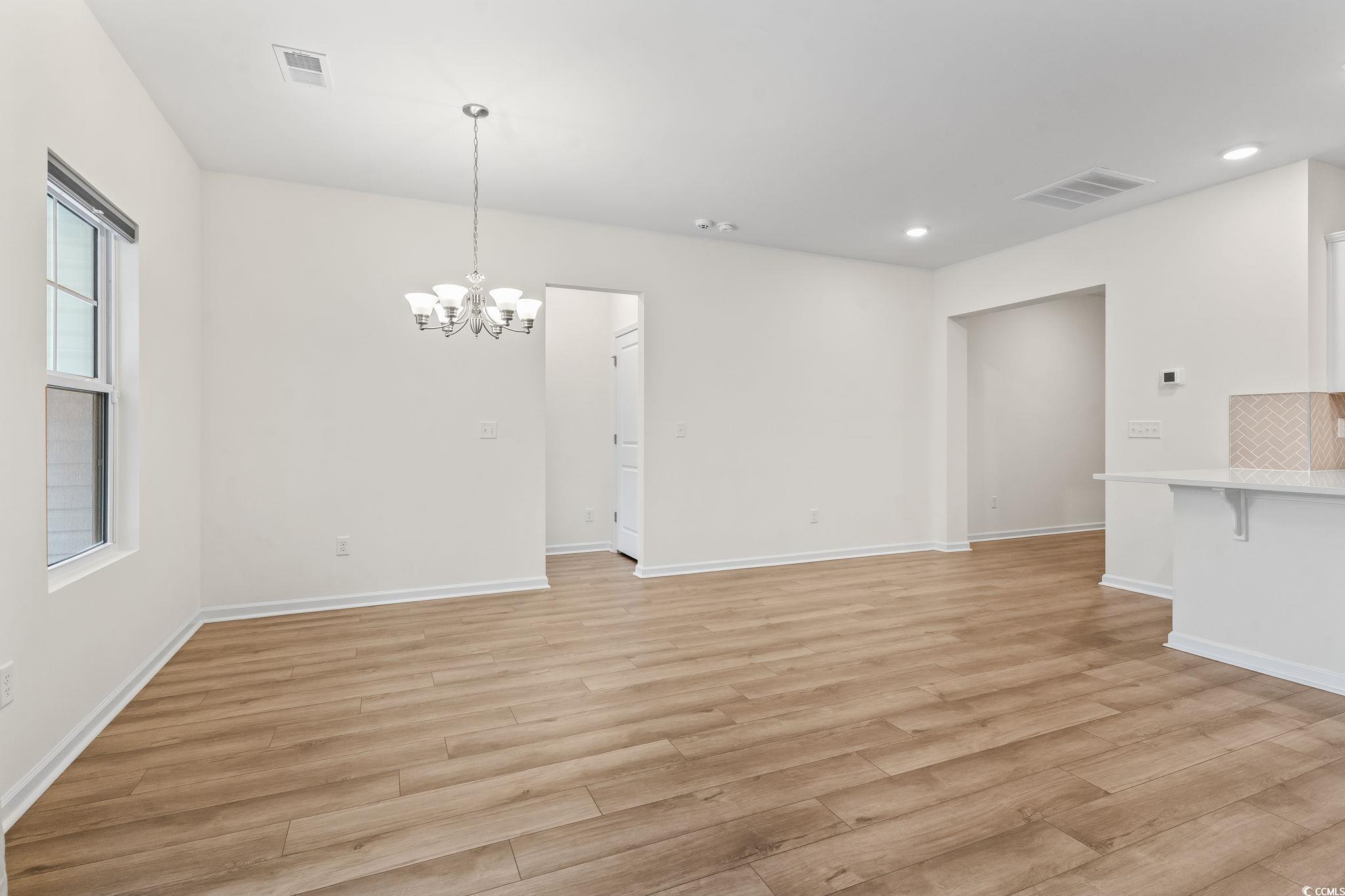 4115 Highway 19 Conway, SC 29526 - Photo 15 of 40 Spacious living area with an open layout, abundant natural light, and seamless flow into the kitchen and dining spaces