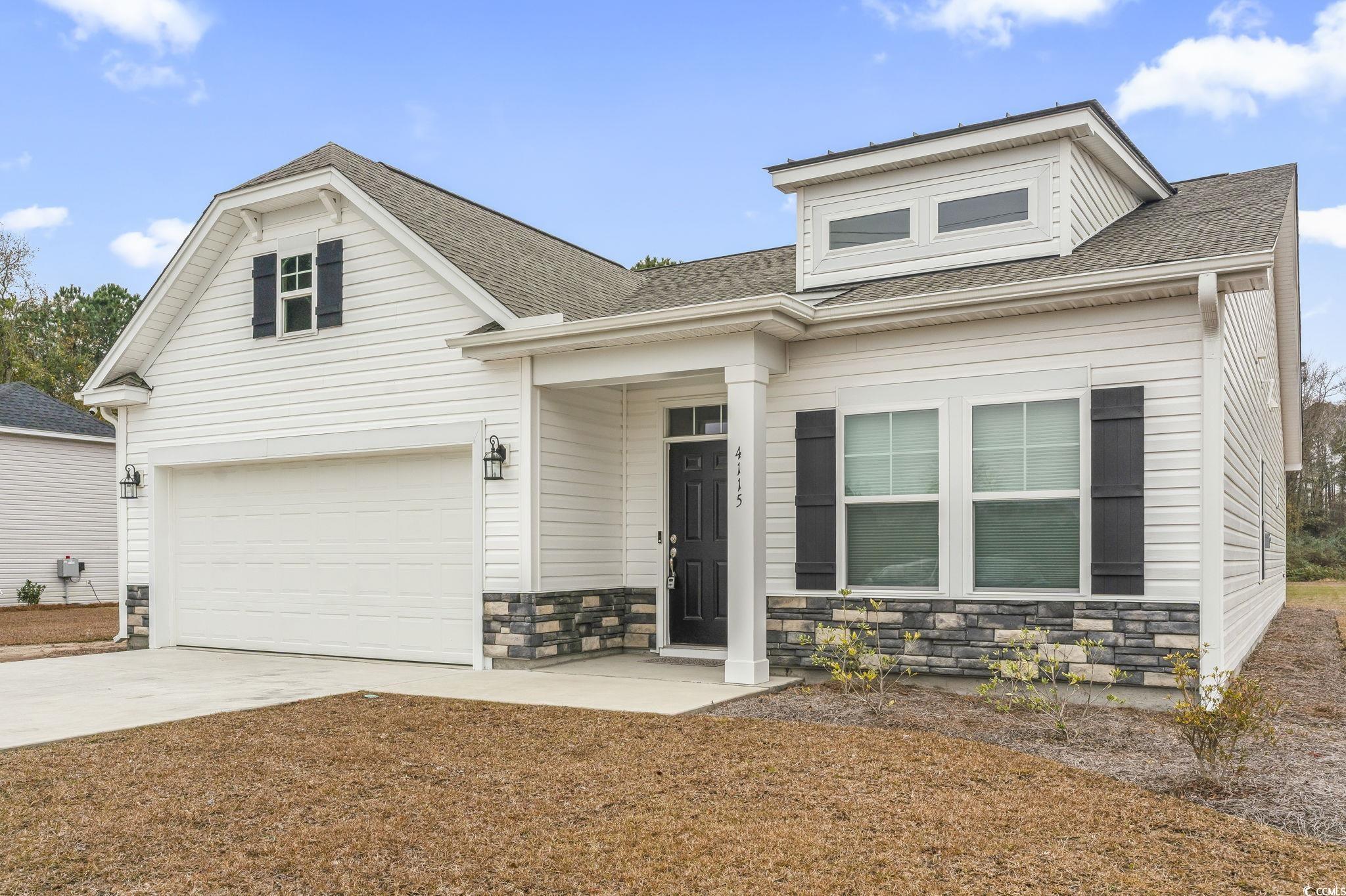 Side-angle perspective showcasing the driveway, front façade, and spacious front yard.
