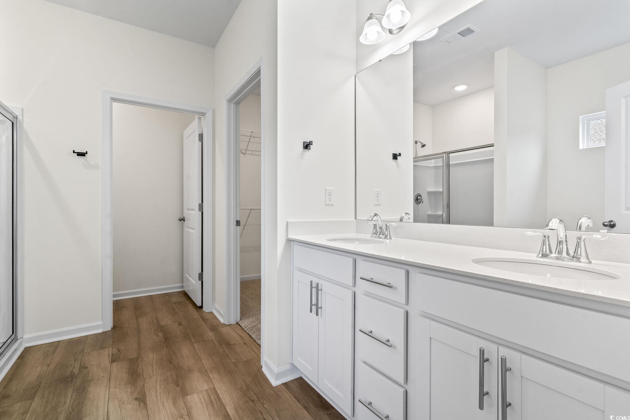 4115 Highway 19 Conway, SC 29526 - Photo 25 of 40 Beautiful ensuite with a double vanity featuring quartz countertops