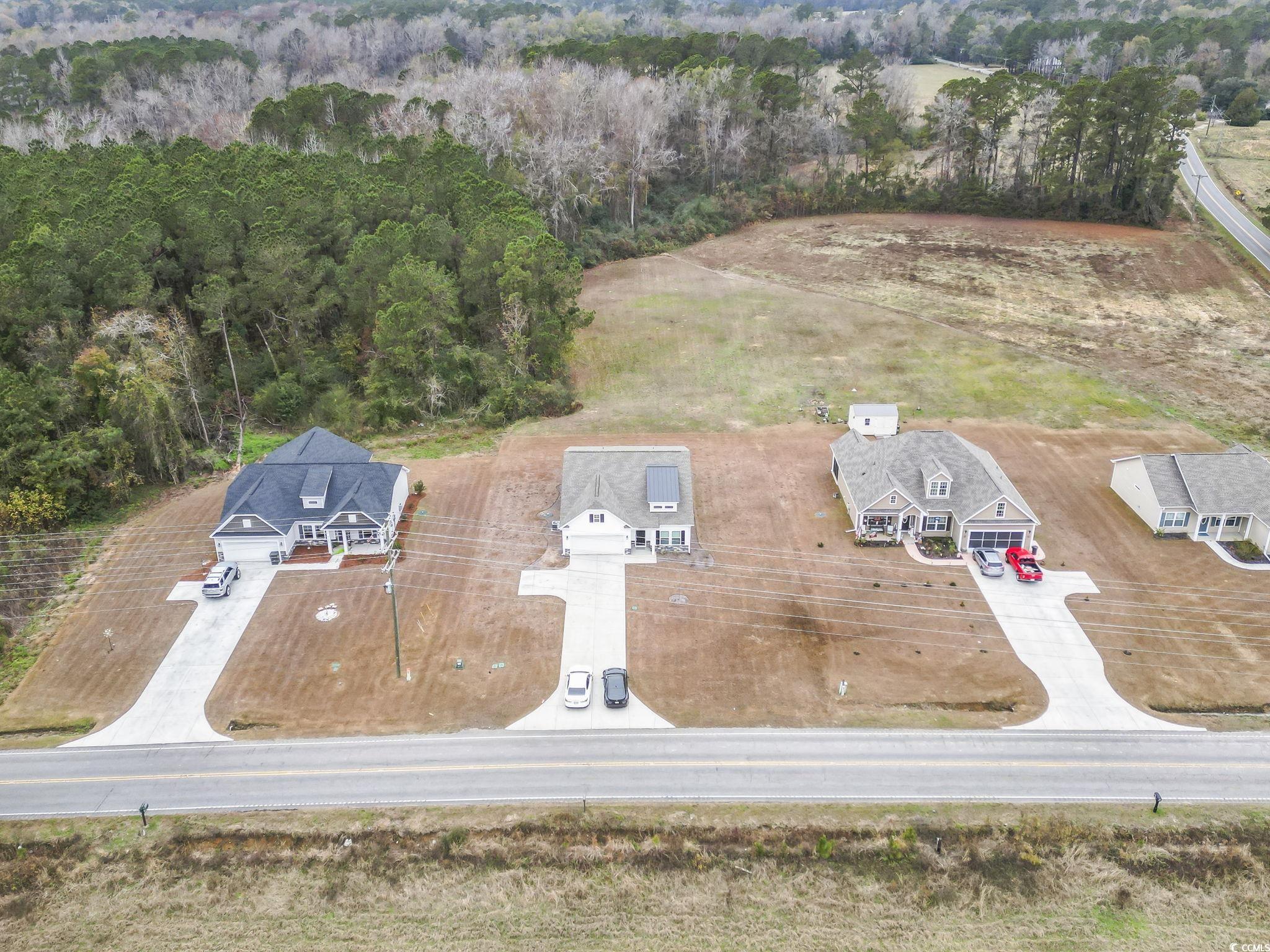 4115 Highway 19 Conway, SC 29526 - Photo 3 of 40 Shows the home from the front, stretching across the full length of the property toward the back acreage.