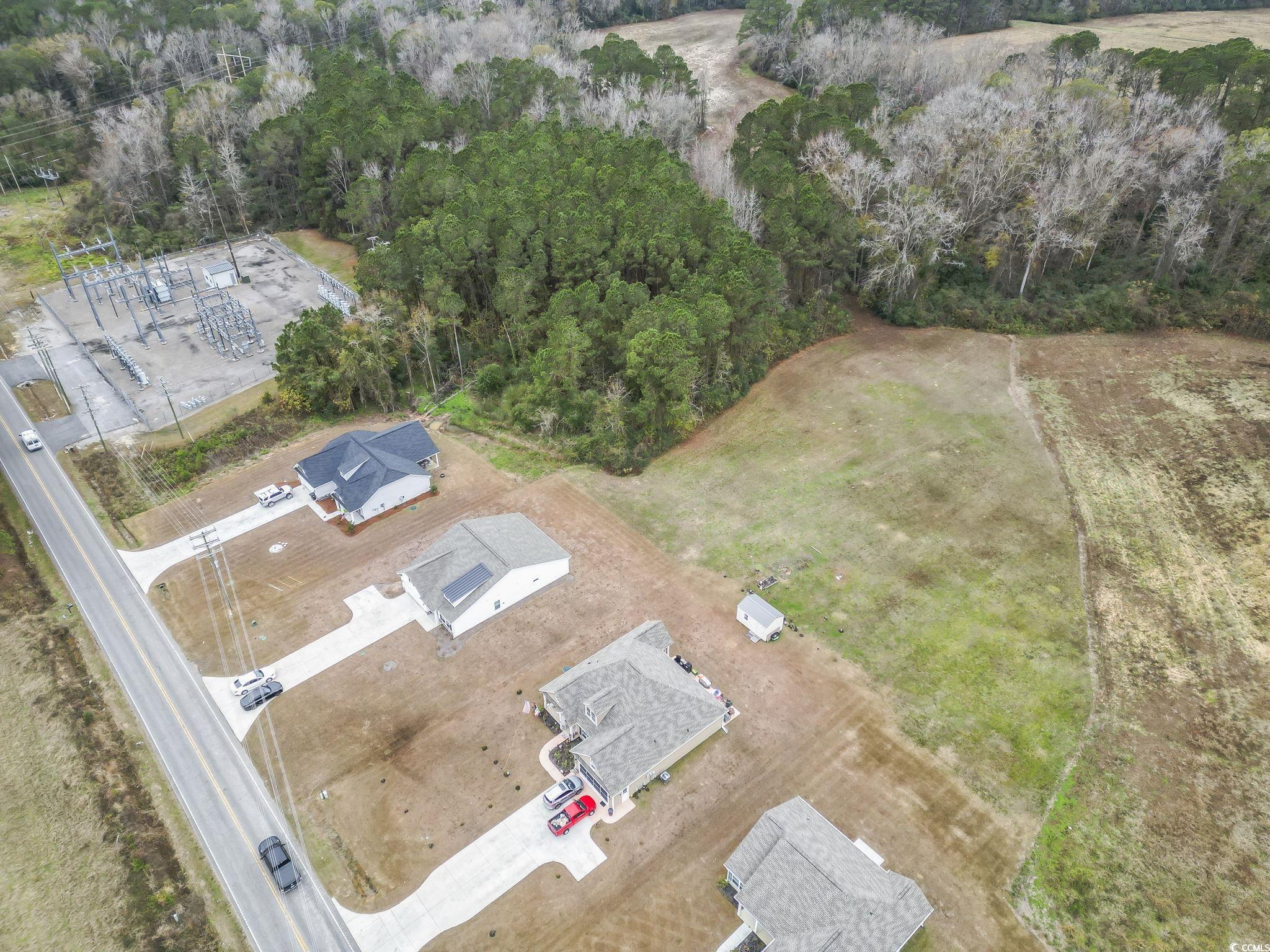 4115 Highway 19 Conway, SC 29526 - Photo 4 of 40 Shows the layout of the driveway, front yard, and parking areas, perfect for RVs, boats, and additional vehicles
