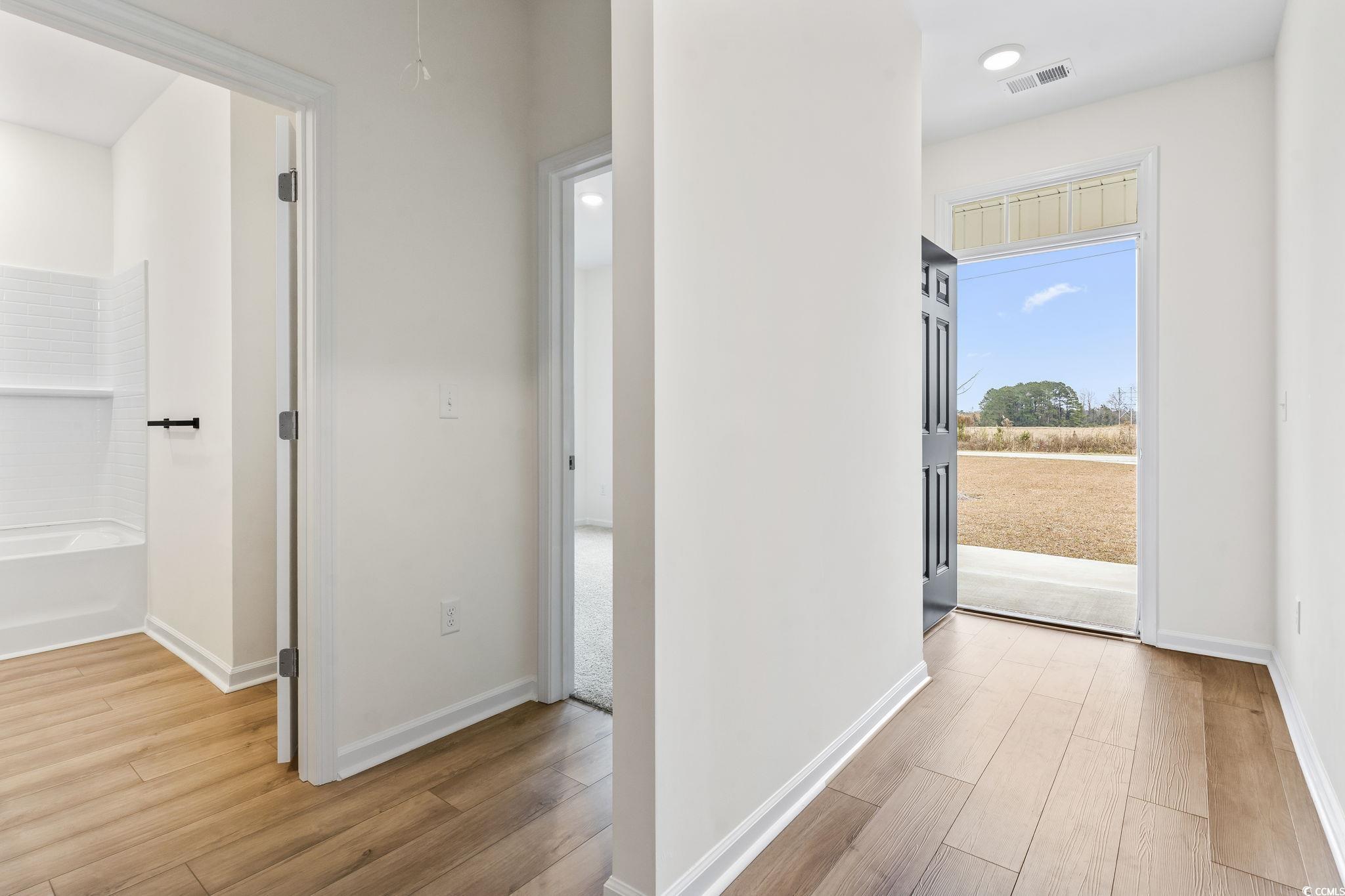 4115 Highway 19 Conway, SC 29526 - Photo 8 of 40 Welcoming entry with natural light and a clear view into the open-concept main living area.