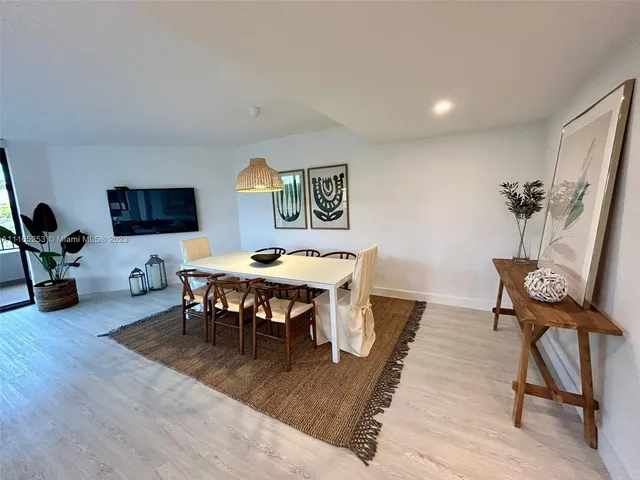 a view of a livingroom and dining room