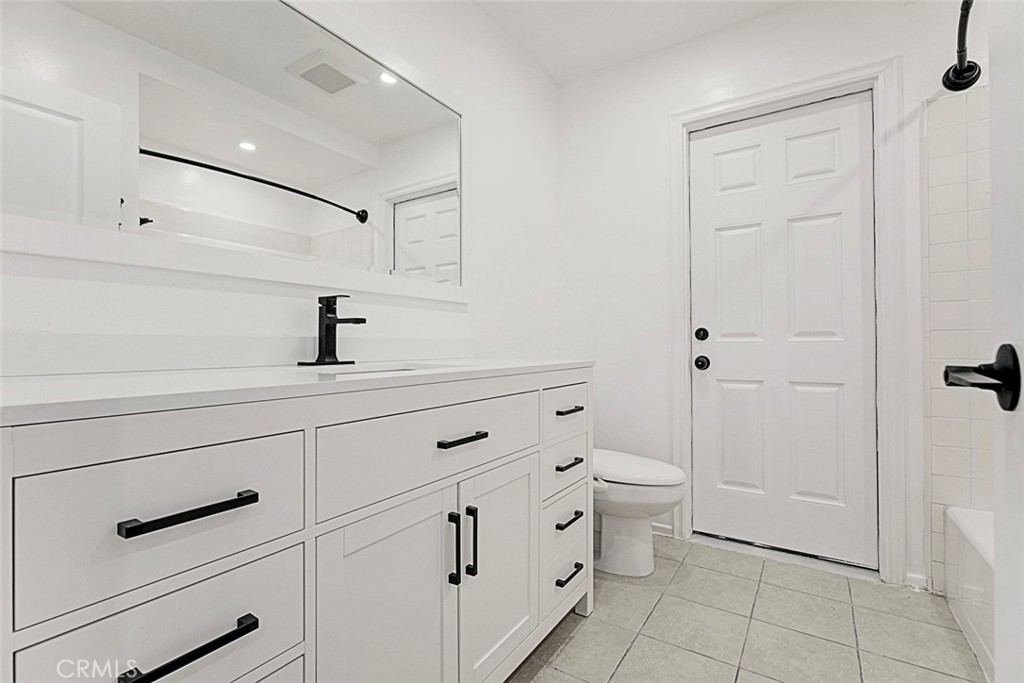 11369 Darby Avenue Porter Ranch, CA 91326 - Photo 25 of 56 a view of bathroom with toilet sink