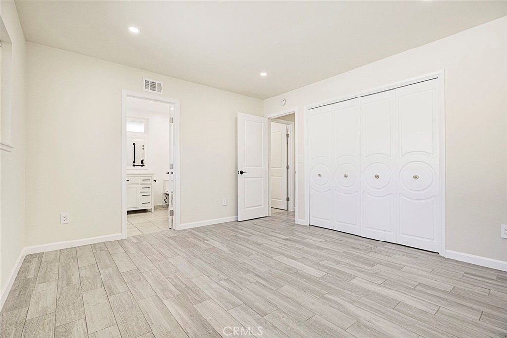 11369 Darby Avenue Porter Ranch, CA 91326 - Photo 29 of 56 a view of empty room with wooden floor