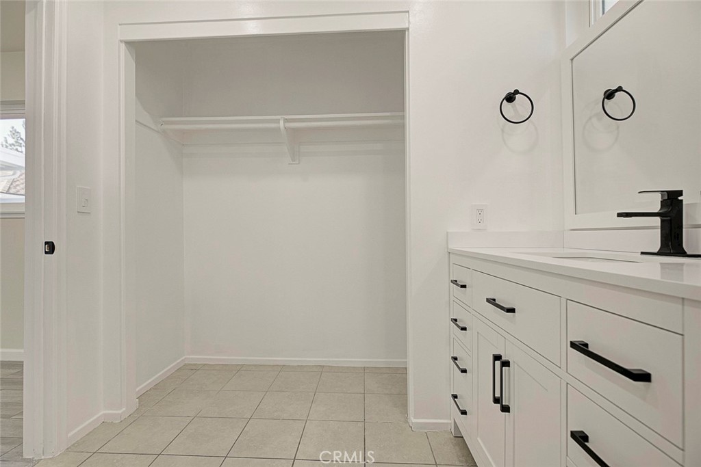 11369 Darby Avenue Porter Ranch, CA 91326 - Photo 32 of 56 a bathroom with a sink and a mirror