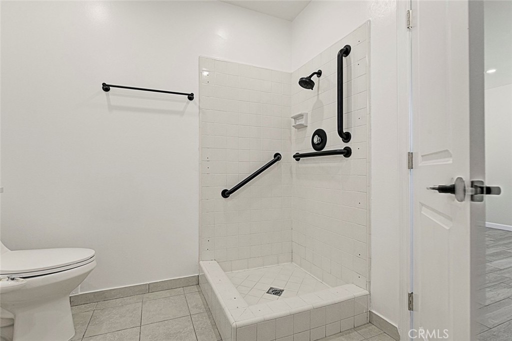 11369 Darby Avenue Porter Ranch, CA 91326 - Photo 33 of 56 a bathroom with a shower