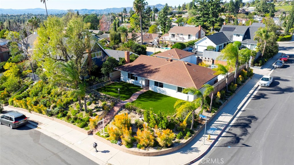 11369 Darby Avenue Porter Ranch, CA 91326 - Photo 42 of 56 an aerial view of a house with a garden and plants
