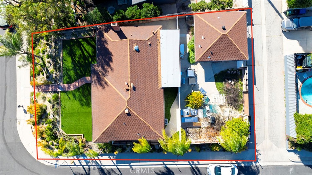 11369 Darby Avenue Porter Ranch, CA 91326 - Photo 45 of 56 an aerial view of a house with a swimming pool