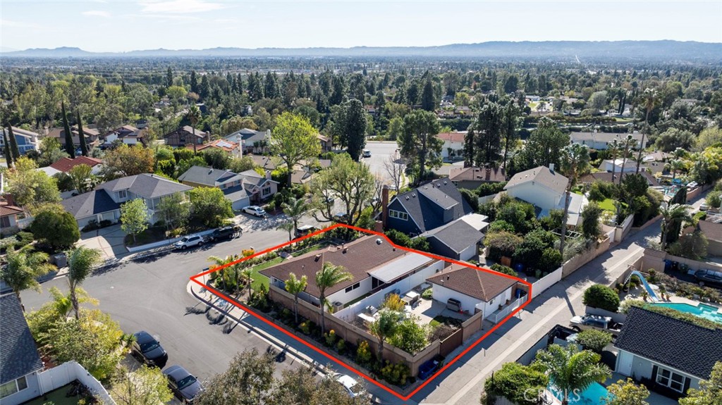 11369 Darby Avenue Porter Ranch, CA 91326 - Photo 47 of 56 an aerial view of a house with a garden