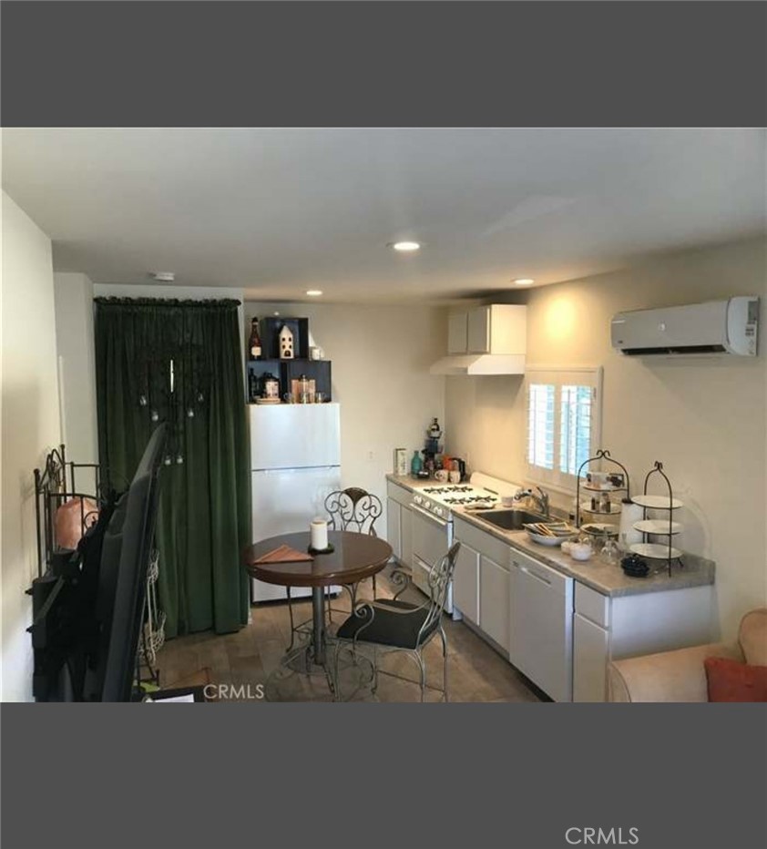 11369 Darby Avenue Porter Ranch, CA 91326 - Photo 54 of 56 a kitchen with a sink and cabinets