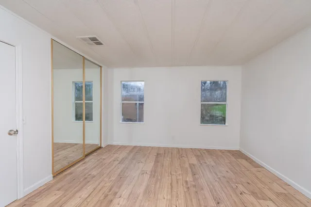 a view of a yard with a patio