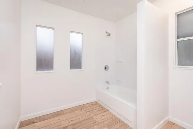 an aerial view of a city with lots of residential buildings