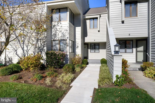 a view of a building with potted plants