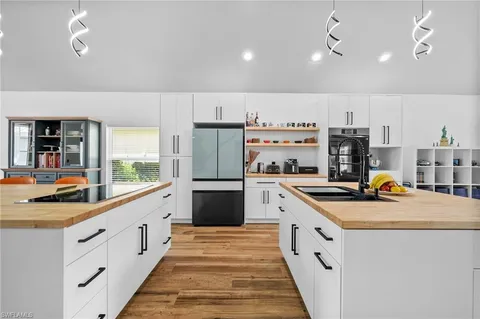 a view of a backyard with a swimming pool