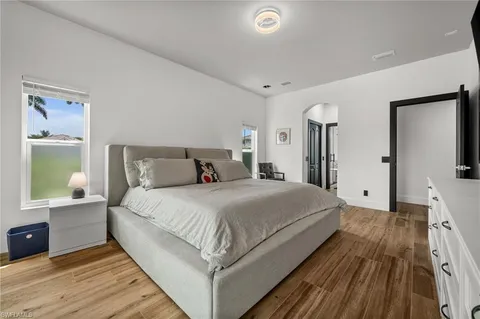 a bathroom with a sink a mirror and a bathtub