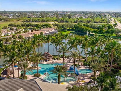 a view of a swimming pool with a patio