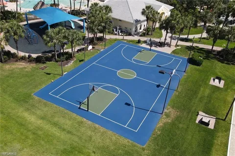 an aerial view of lake residential house with outdoor space and seating