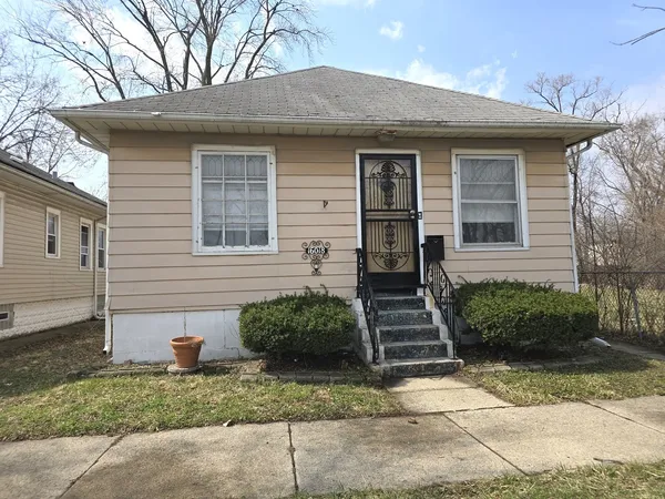 $52,000 | 16018 Loomis Avenue, Harvey, IL 60426