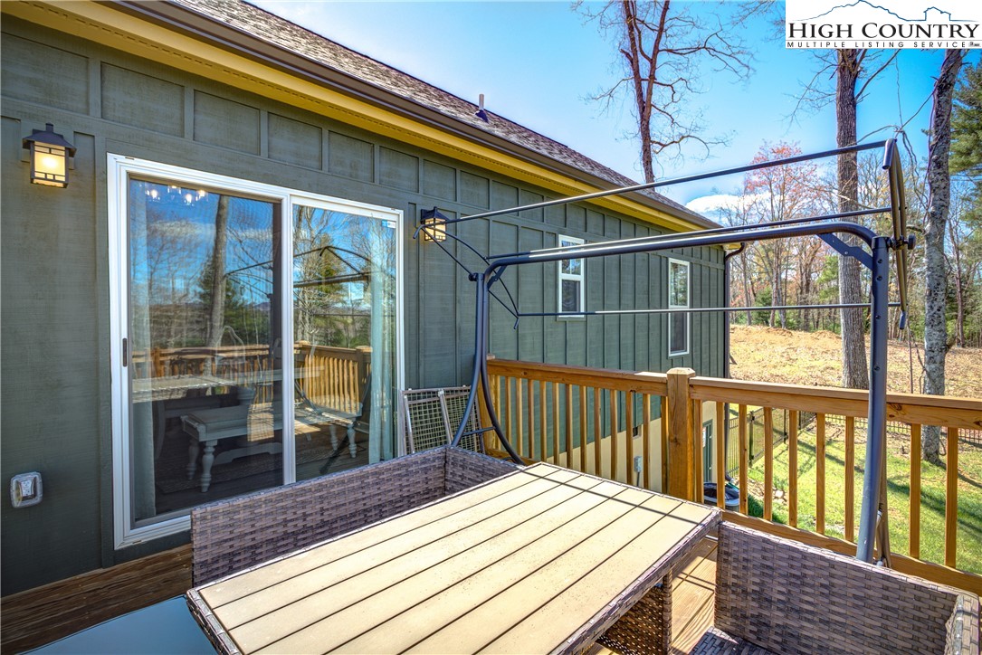 397 Turtle Ridge Road Sparta, NC 28675 - Photo 12 of 33 a view of a wooden deck