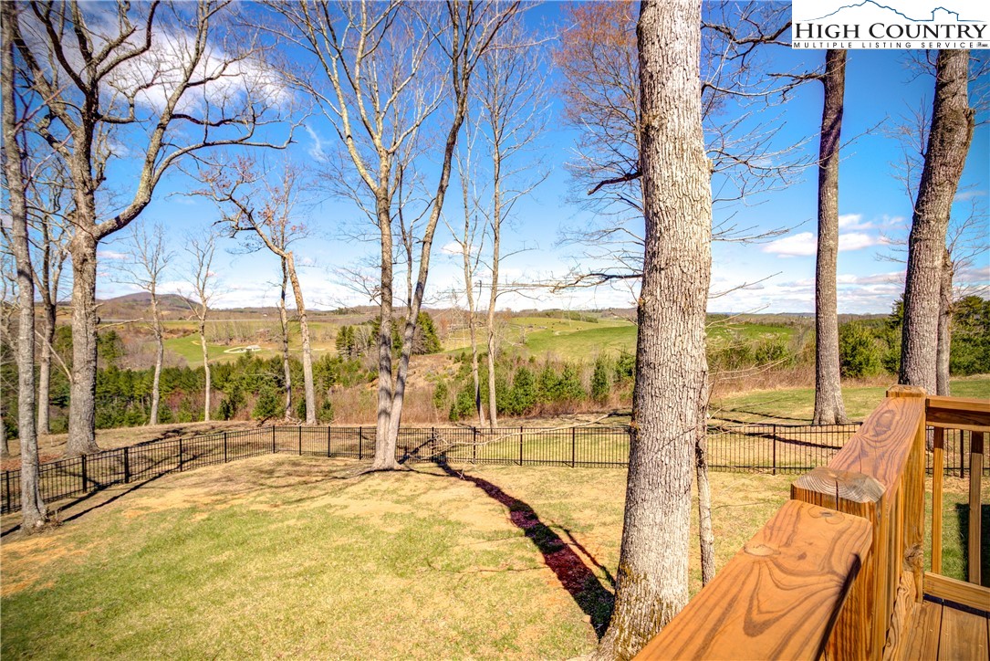 397 Turtle Ridge Road Sparta, NC 28675 - Photo 13 of 33 a view of a swimming pool with a patio