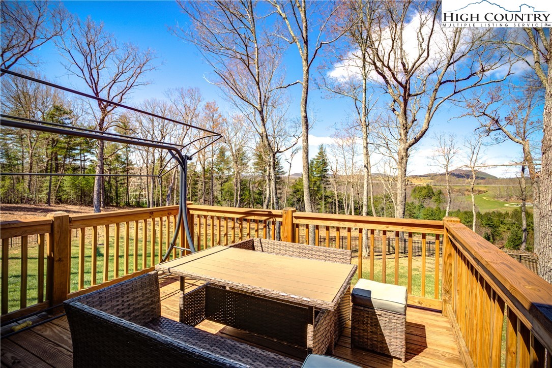 397 Turtle Ridge Road Sparta, NC 28675 - Photo 10 of 33 a view of a two chairs in the balcony