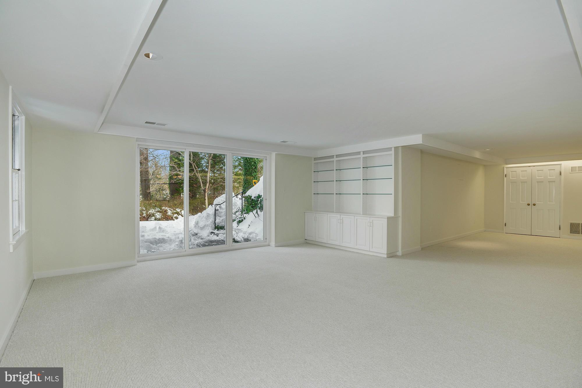 5039 Overlook Road Northwest Washington, DC 20016 - Photo 23 of 30 Lower level walkout family room