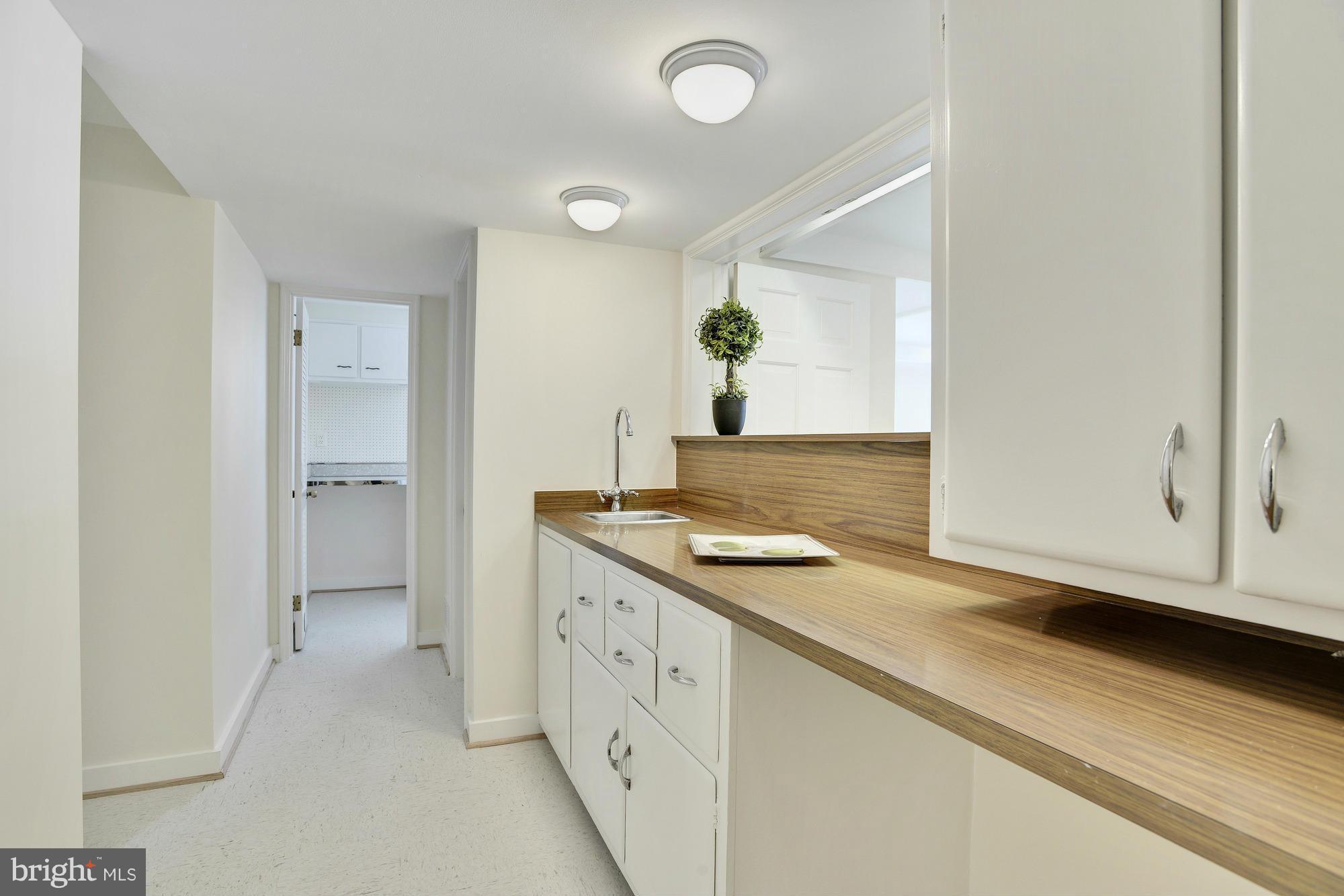 5039 Overlook Road Northwest Washington, DC 20016 - Photo 26 of 30 Lower level wet bar