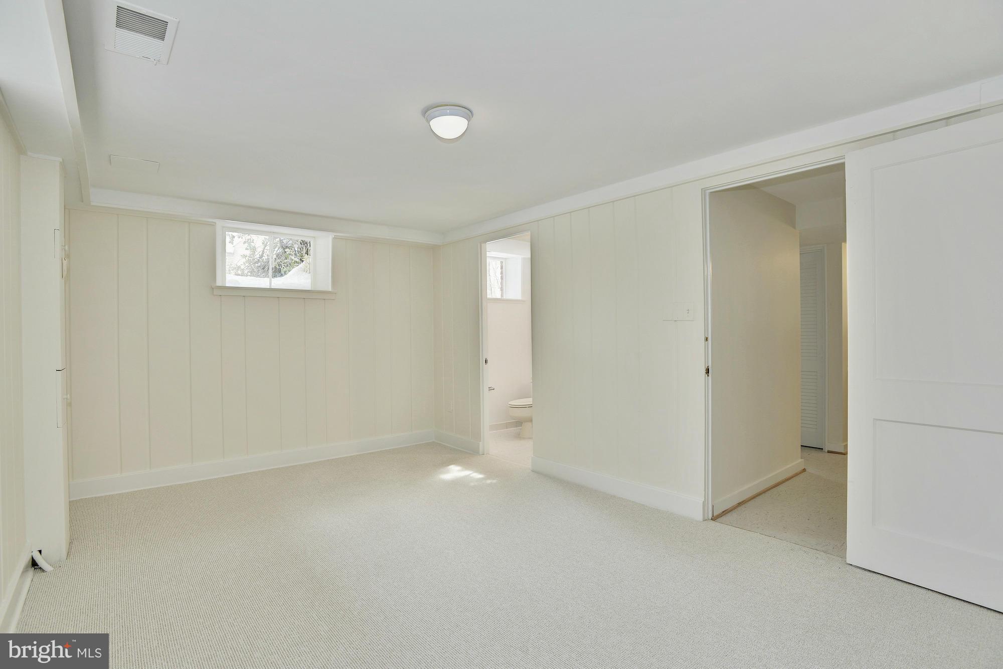 5039 Overlook Road Northwest Washington, DC 20016 - Photo 27 of 30 Lower level bedroom (six)