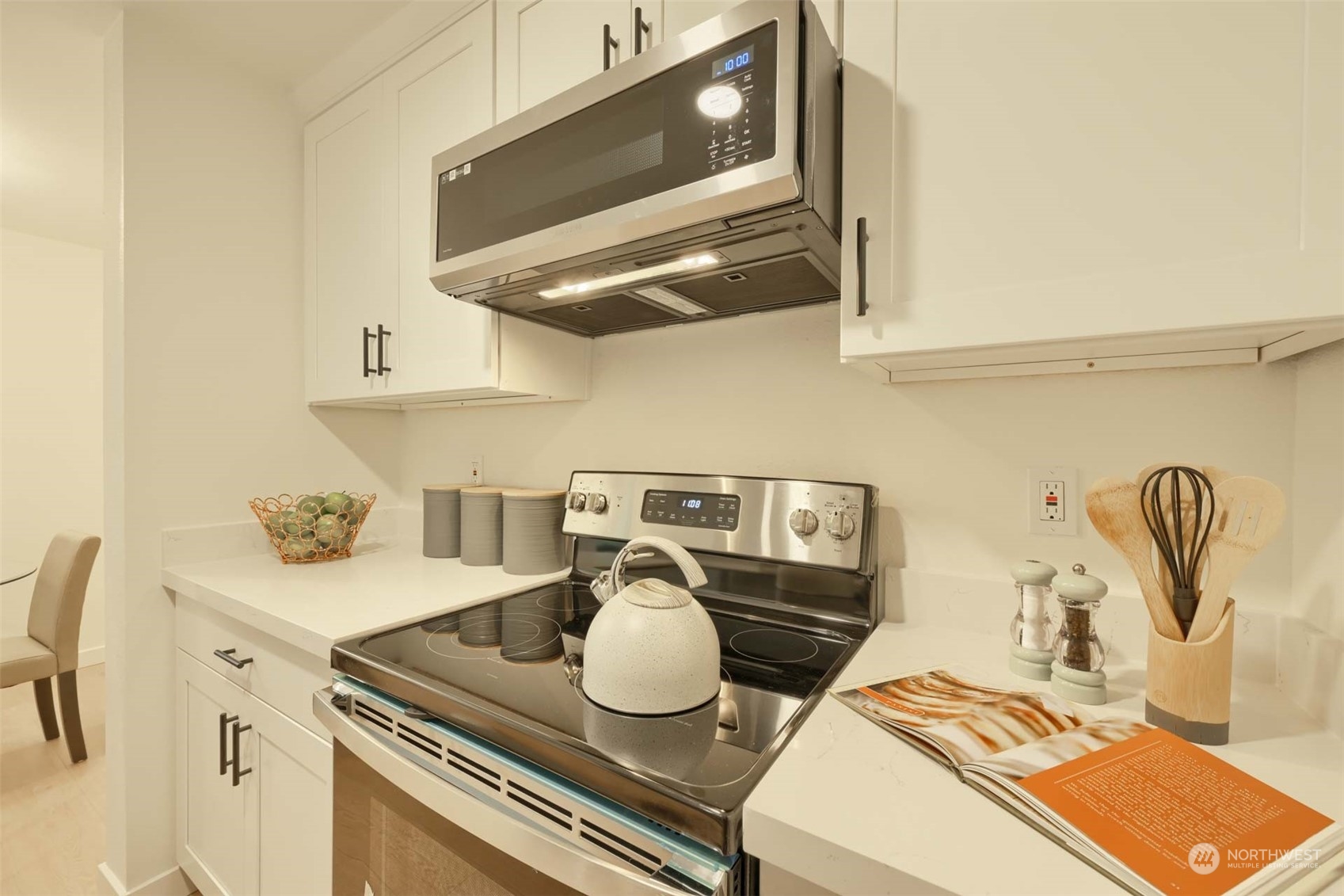 17536 149th Avenue Southeast, Unit O 9 Renton, WA 98058 - Photo 13 of 20 a kitchen with a sink and cabinets