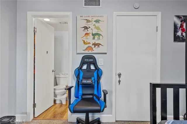 a view of entryway with wooden floor