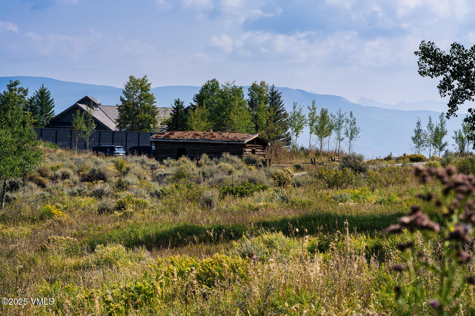 284 Settlers Loop Edwards, CO 81632 - Photo 2 of 53 a view of a lake with a house in the background