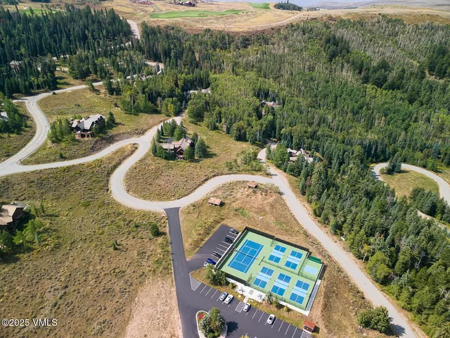 a view of swimming pool with an outdoor space and seating area