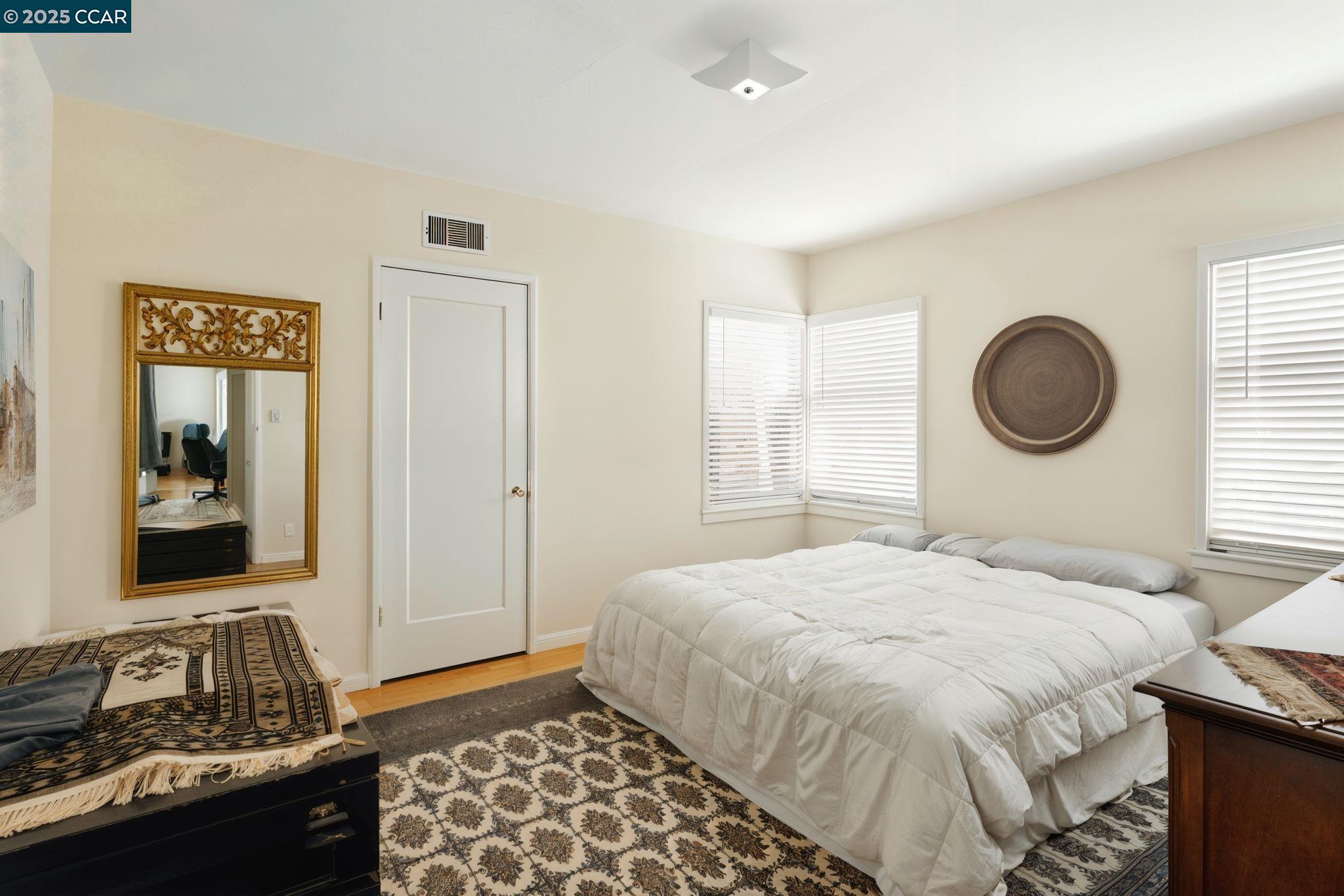 500 Wano Street Martinez, CA 94553 - Photo 19 of 30 a bedroom with a bed and a window