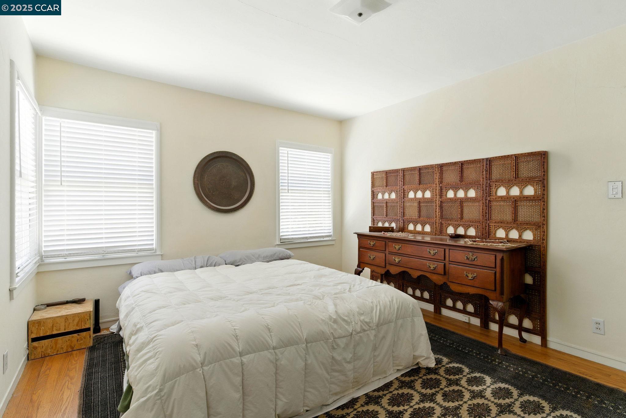 500 Wano Street Martinez, CA 94553 - Photo 20 of 30 a bedroom with a bed and dresser