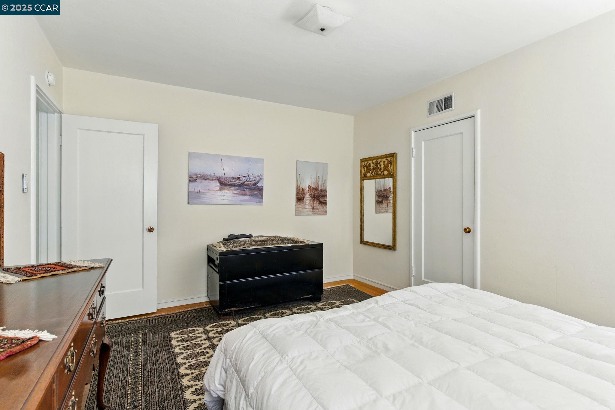 500 Wano Street Martinez, CA 94553 - Photo 22 of 30 a bedroom with a bed and dresser