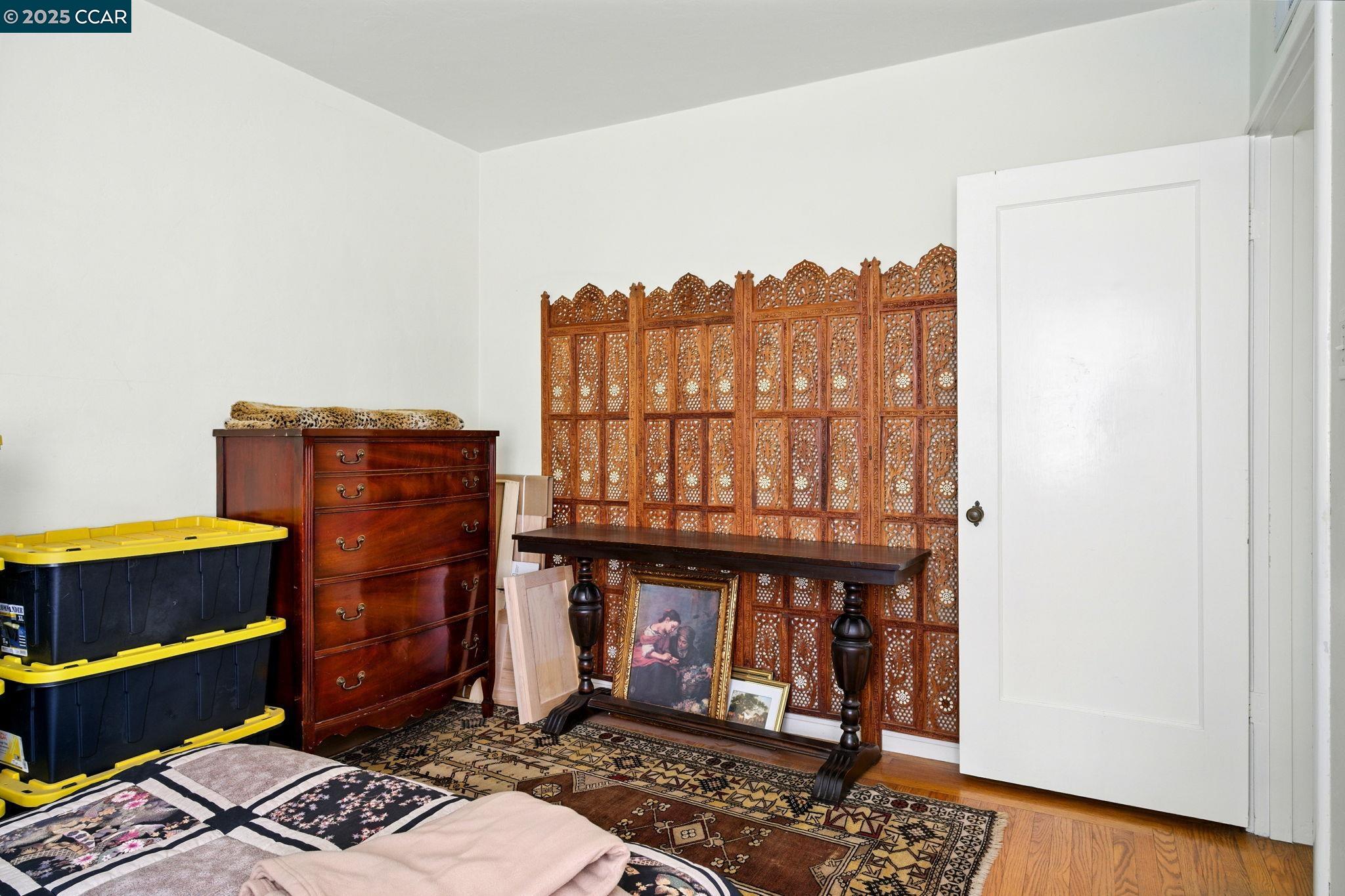 500 Wano Street Martinez, CA 94553 - Photo 27 of 30 a room with furniture and wooden floor