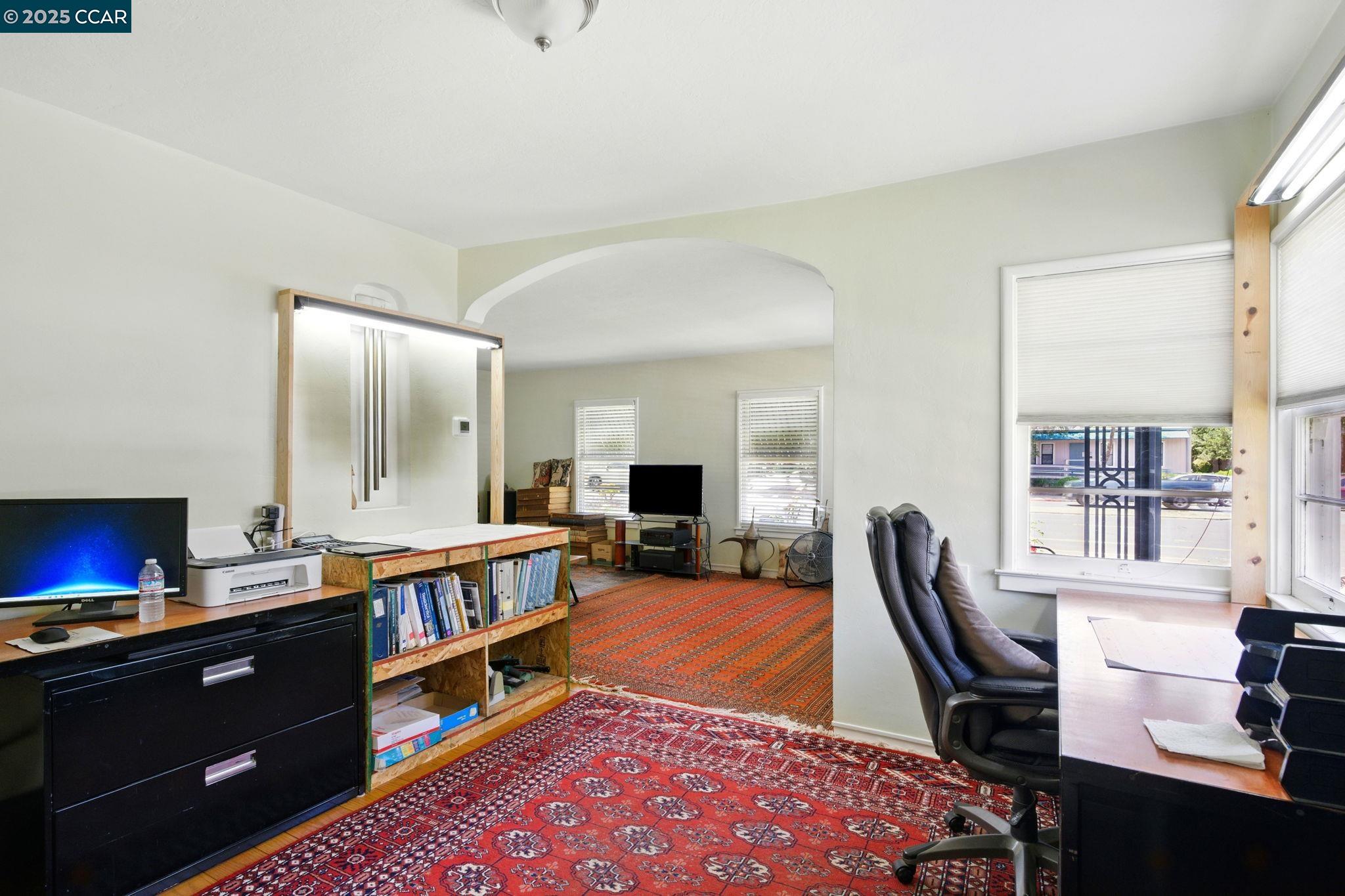 500 Wano Street Martinez, CA 94553 - Photo 29 of 30 a living room with furniture and a flat screen tv