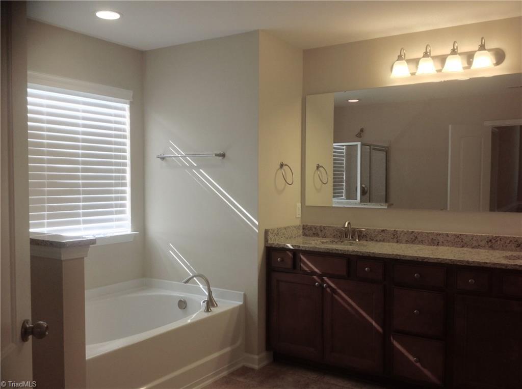 3406 Lamplight Way High Point, NC 27265 - Photo 18 of 29 Gorgeous counter tops with double vanity in master bath.