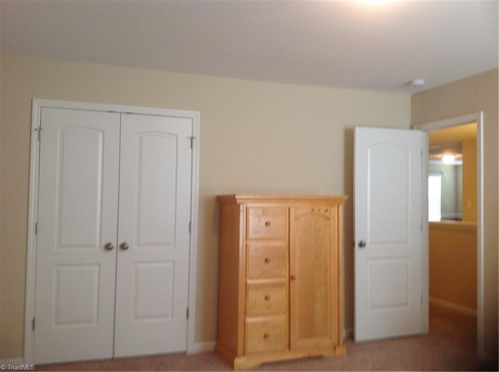 3406 Lamplight Way High Point, NC 27265 - Photo 23 of 29 Bedroom #4. All the bedrooms have large closets.