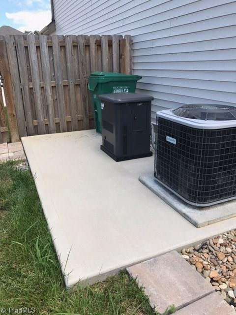 3406 Lamplight Way High Point, NC 27265 - Photo 27 of 29 Extra large cement pad. 10KW standby house Generator (Natural Gas)