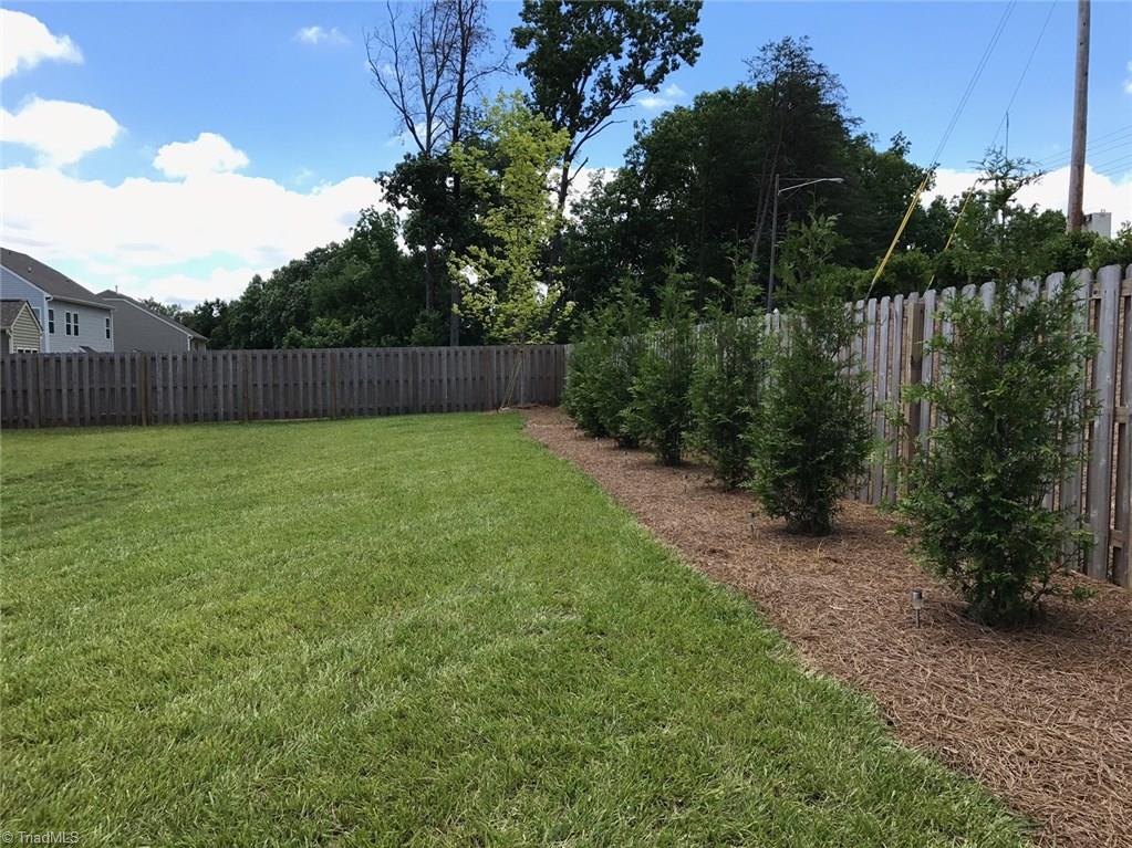 3406 Lamplight Way High Point, NC 27265 - Photo 29 of 29 Whole backyard has Privacy Fence with trees that will completely block for privacy. The house does not have a house behind it.