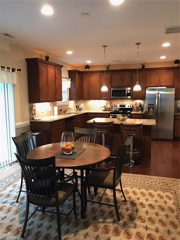 3406 Lamplight Way High Point, NC 27265 - Photo 10 of 29 Beautiful kitchen with granite and over and under cabinet lighting