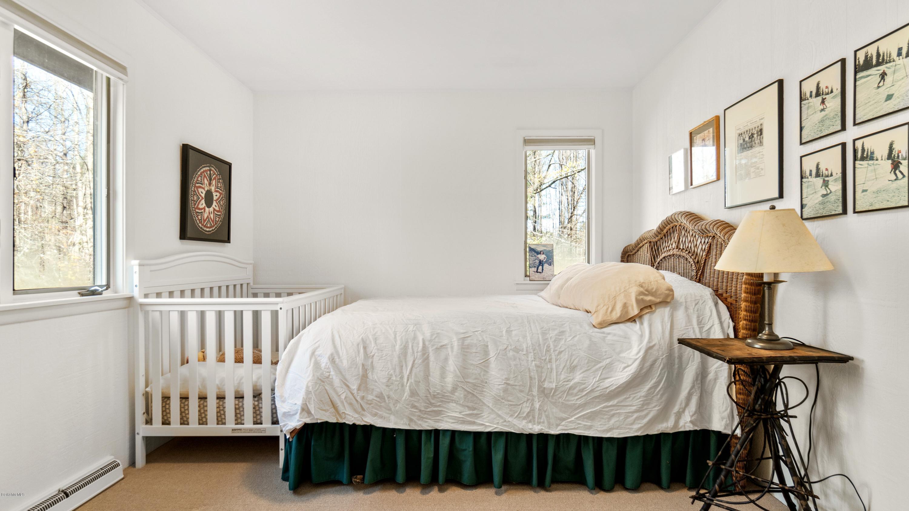 23 Interlaken Road Stockbridge, MA 01266 - Photo 11 of 26 a bedroom with a bed and window