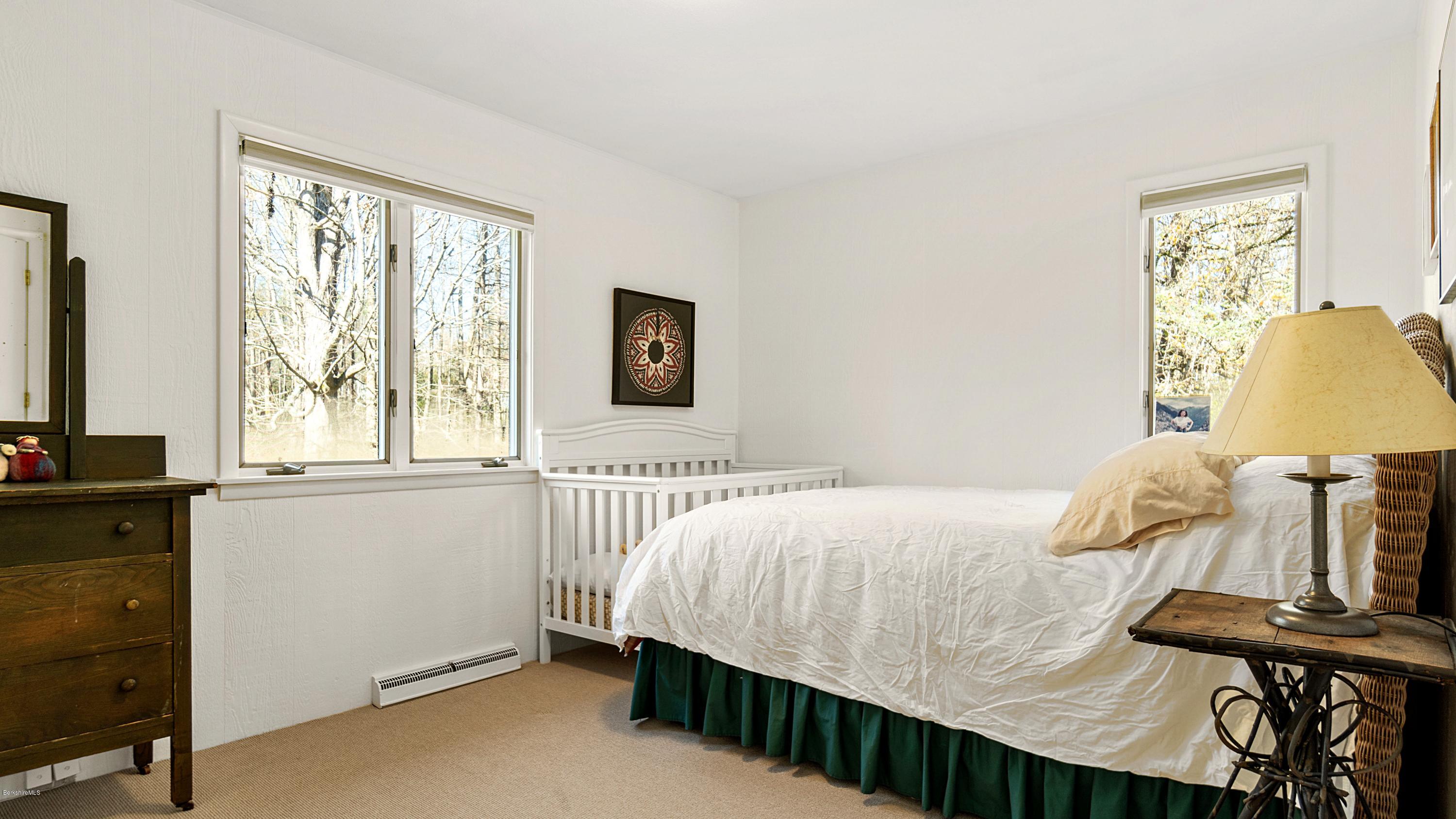 23 Interlaken Road Stockbridge, MA 01266 - Photo 12 of 26 a bedroom with a bed and a window
