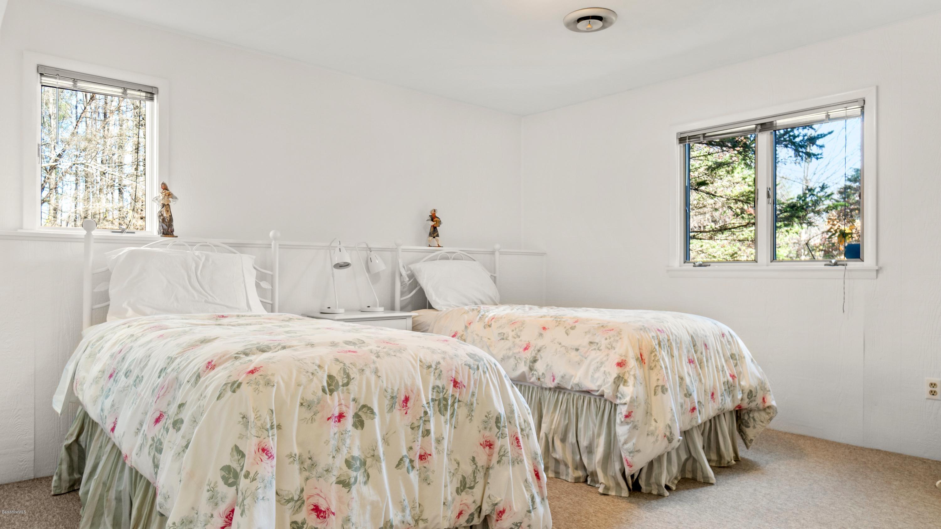 23 Interlaken Road Stockbridge, MA 01266 - Photo 15 of 26 a bedroom with a bed and a window