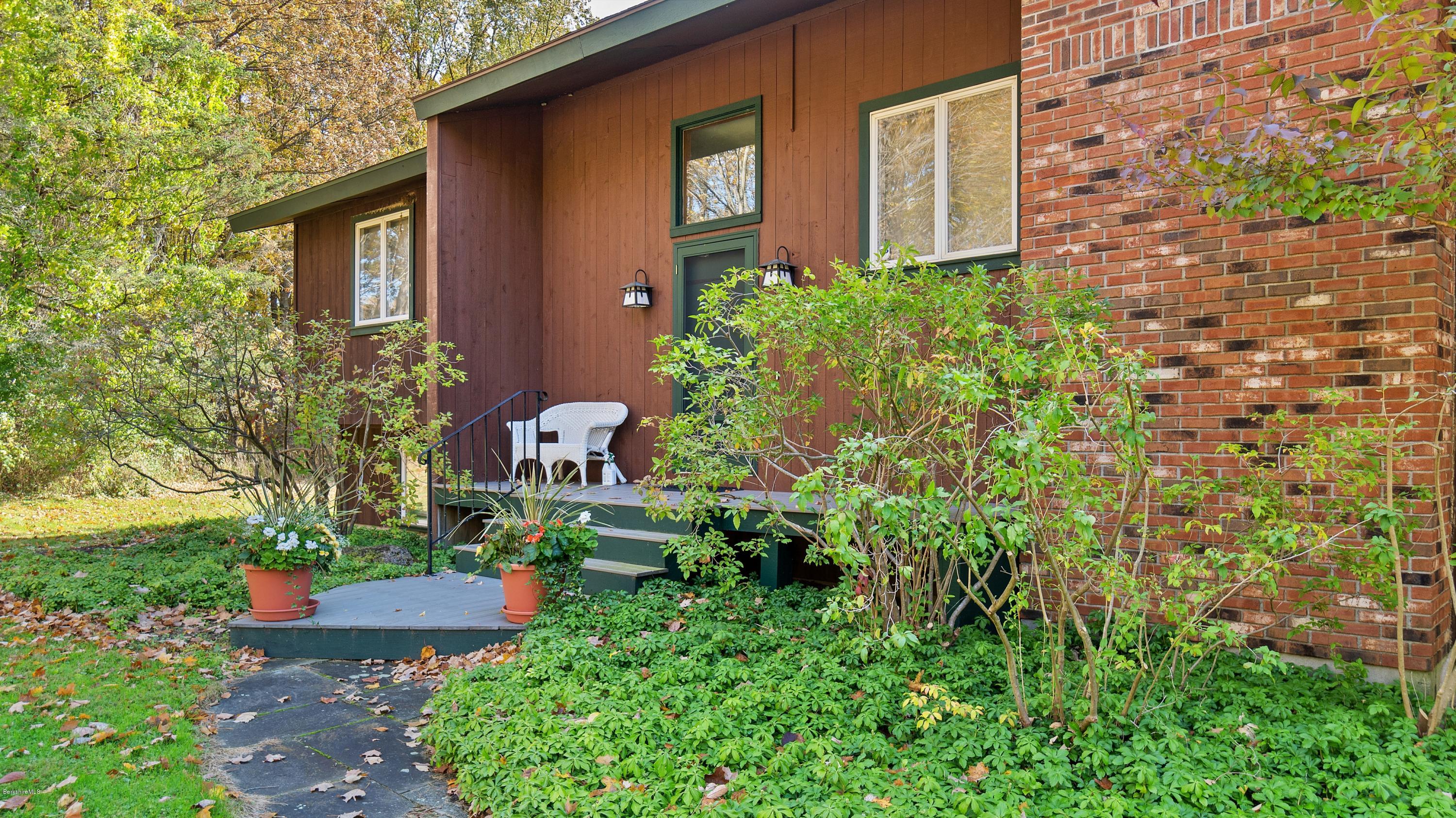 23 Interlaken Road Stockbridge, MA 01266 - Photo 20 of 26 a front view of a house with garden