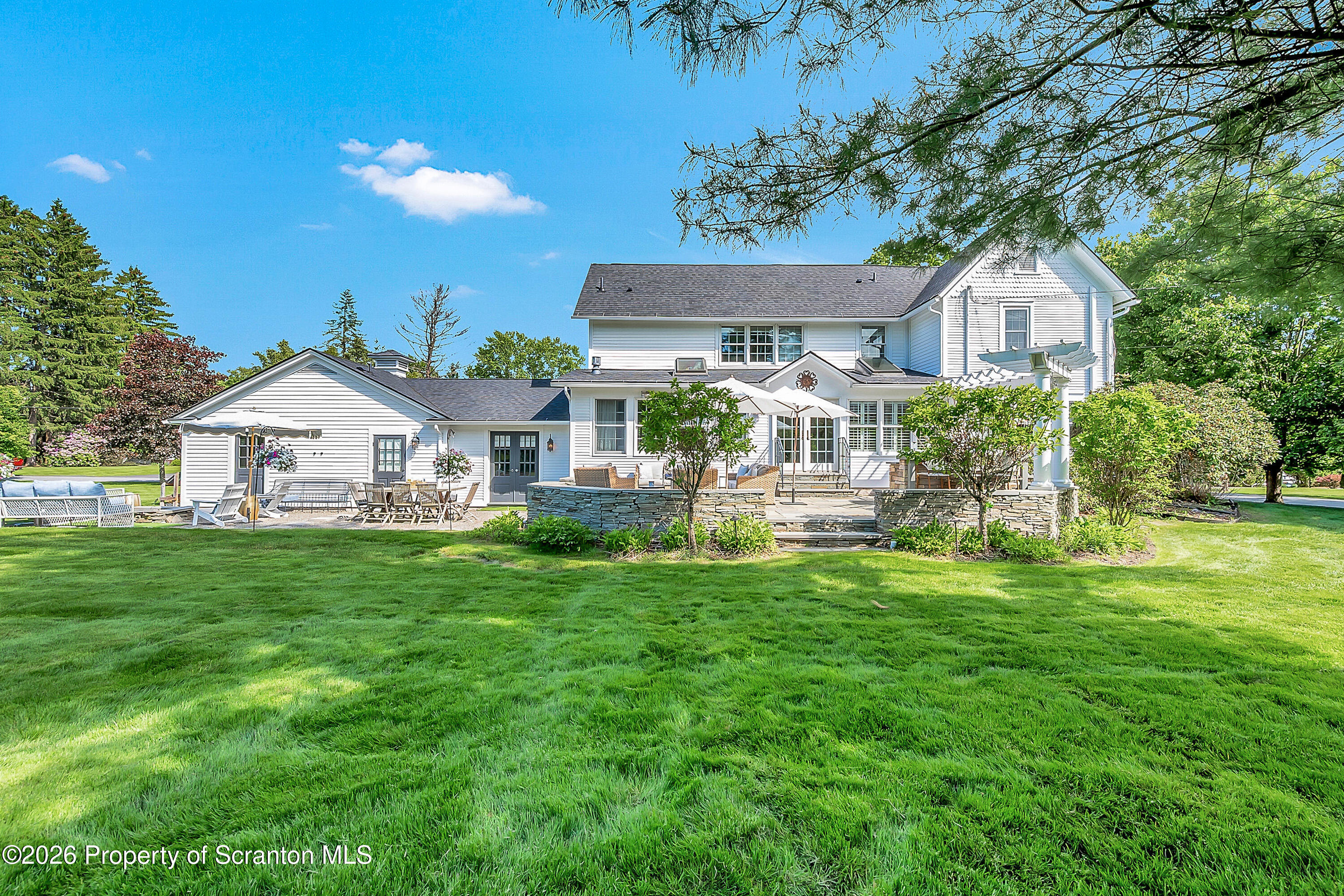 330 Glenburn Road Clarks Green, PA 18411 - Photo 6 of 69 a front view of a house with a garden and yard