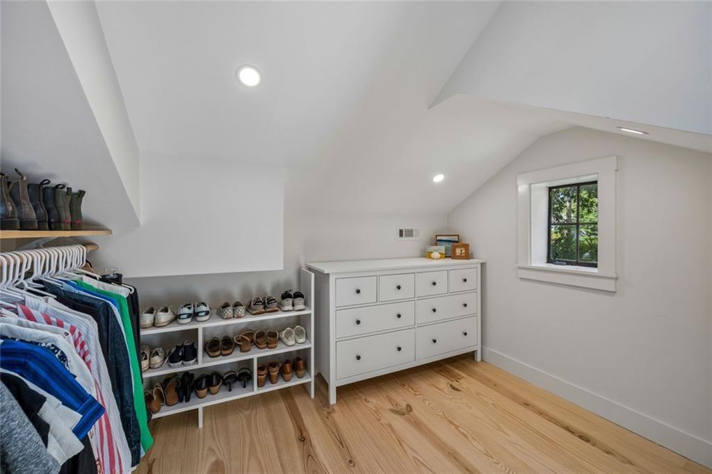 2069 Edinburgh Terrace Northeast Atlanta, GA 30307 - Photo 36 of 72 a view of walk in closet with clothes and shoes