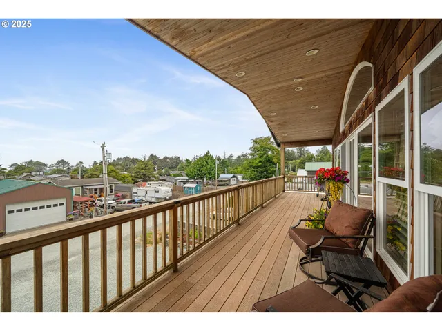 a view of balcony with furniture